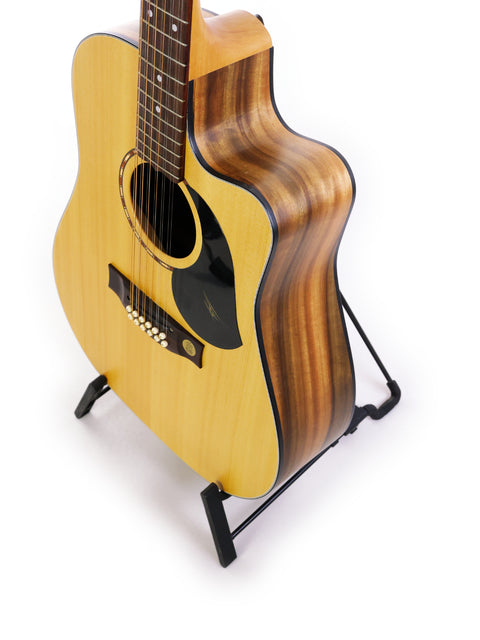 A 2009 Maton EM425C 12-string guitar on a stand, featuring a striking white background that emphasizes its beauty.