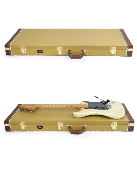 A Fender 25th Anniversary Stratocaster guitar in one case, with another empty case beside it, highlighting musical craftsmanship.