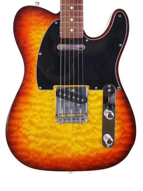 A Fender Custom Shop 50s Telecaster guitar with a vibrant sunburst finish, showcasing its classic design from 1998.