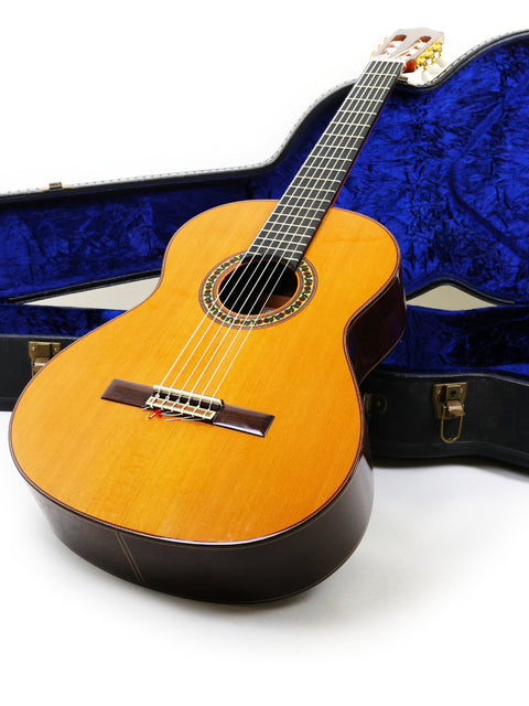 A Ramirez 4NE guitar, made in Spain in 2012, placed in a case on a white backdrop.