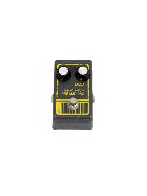 A classic 1970s DOD Overdrive Preamp 250 pedal featuring a bold yellow and black design