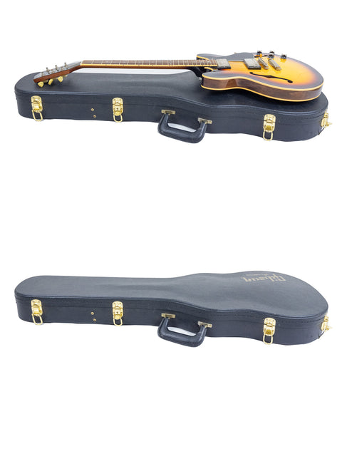 A pair of guitars in different orientations, highlighting a Gibson Custom Shop ES 339 Memphis, USA, 2009 model.