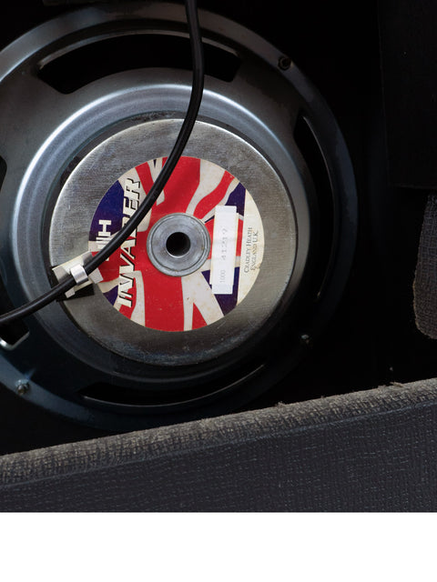 A record player featuring a British flag, highlighting the Laney VC 30-212 Class A, made in the UK in 2000.