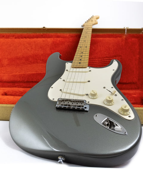 A sleek grey Fender Custom Shop Stratocaster from the Eric Clapton Signature Series, made in the USA, 1988.