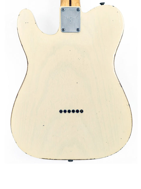 A sleek white guitar featuring a black pickguard, representing the 2006 Fender Custom Shop Chris Fleming Masterbuilt 55 Tele.