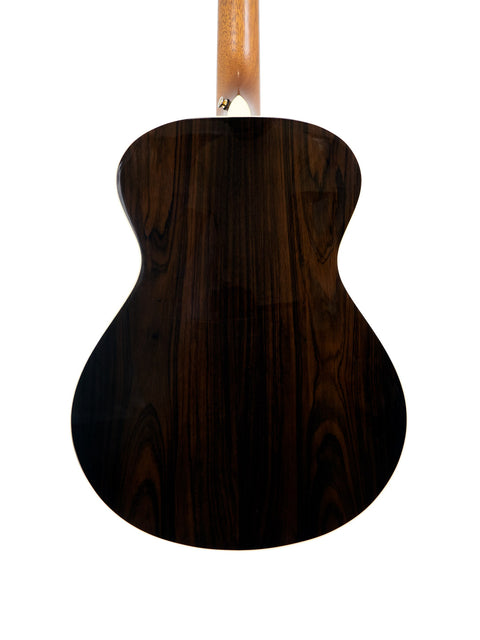 A stunning Breedlove Journey Concert guitar with a wooden back and neck, highlighting its limited edition Sitka/Brazilian design.