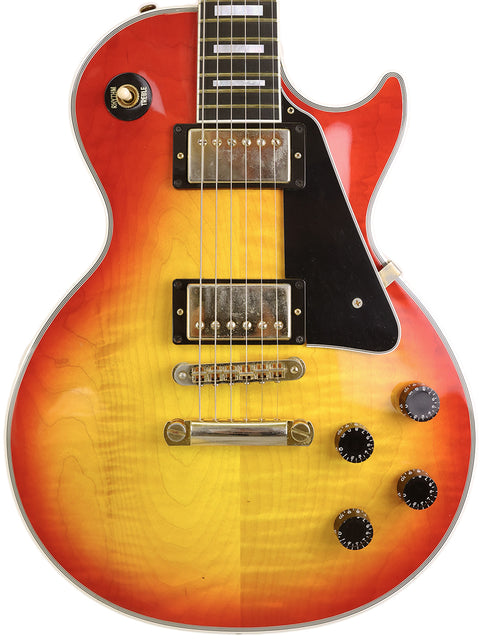 A stunning Gibson Les Paul Custom in sunburst finish, crafted by Gibson Custom Shop, USA, in 2014.