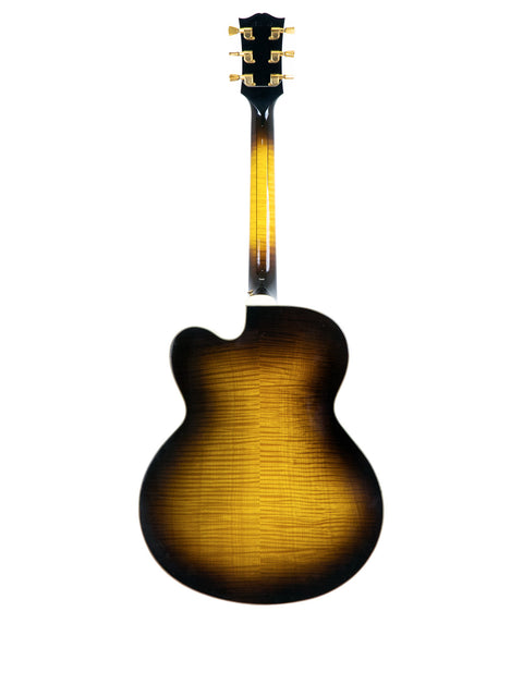 A sunburst-finished Gibson Custom Shop Le Grand Archtop guitar from 1997, showcasing its elegant design and craftsmanship.