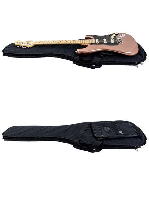 A vibrant pink Fender Stratocaster guitar is nestled in a stylish black case, highlighting its eye-catching design.