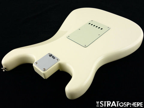 A white guitar, the Fender '60s Strat Partscaster, with a black pick guard, highlighting custom shop craftsmanship from the USA, 2020.