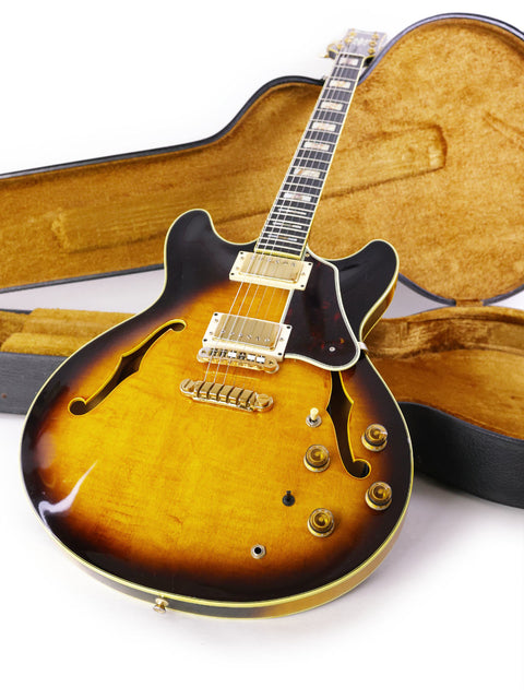 An Ibanez Artist AS200 guitar from Japan, 1981, resting in its case, highlighting its elegant shape and rich history.