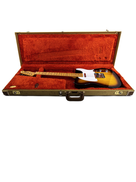 An orange guitar case for a Fender American Vintage ’58 Telecaster, displayed on a white backdrop.