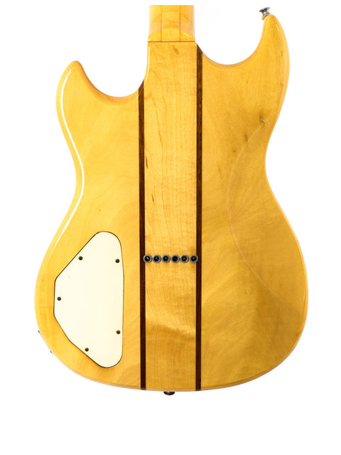 Aria Pro II TS 400 guitar with a wooden body and white pickguard, showcasing its vintage charm from Japan, 1980.