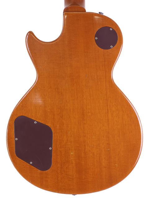 Back view of a brown Gibson Custom Shop Historic Les Paul 1956 Reissue guitar, showcasing its elegant design and upgrades.
