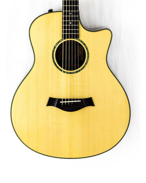 Beautiful Taylor Custom GS Baritone 6 acoustic guitar, crafted in 2011, featuring a grand body and elegant wood details.