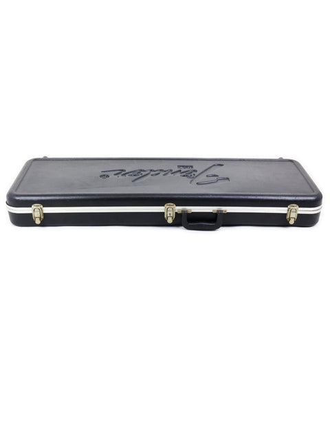 Black case labeled "singer," specifically for the Fender Strat Plus Deluxe, USA, from 1989.