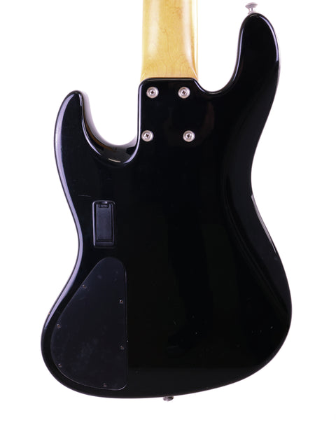 Black electric guitar with a wooden body, showcasing the Sadowsky NYC Jazz Bass 5 String, made in the USA, 2000.