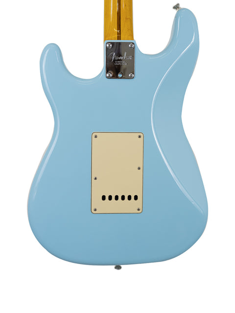 Blue electric guitar with a white body, featuring a Warmoth Strat Partscaster design, made in the USA in 2012.
