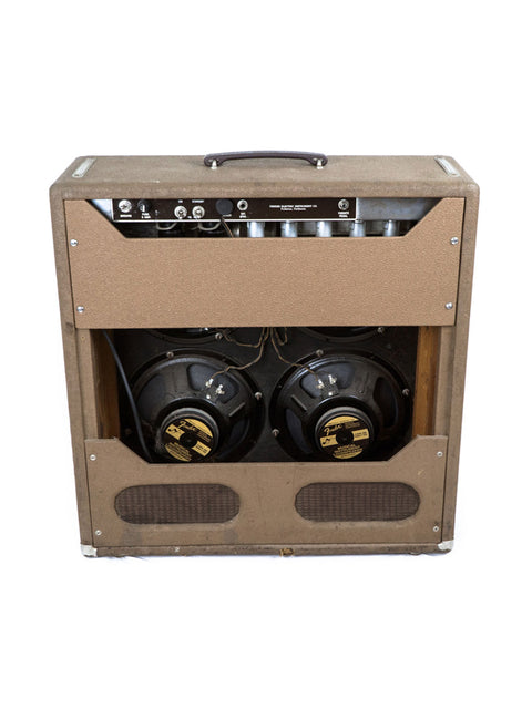 Brown Fender 6G12A Concert Amp from 1961, showcasing two speakers in a classic design.