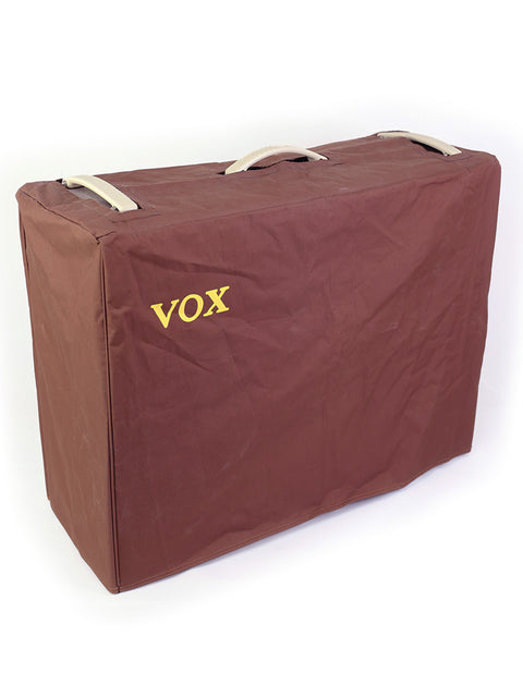 Brown case with "vox" printed on it, representing the Vox AC30HW2 2x12 Combo Amplifier made in 2013.