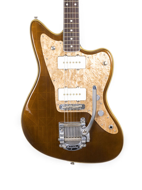 Brown guitar featuring a white pickguard, showcasing the Zachary & Mercer Mastermind “Deluxe” Offset from Aust 2021.