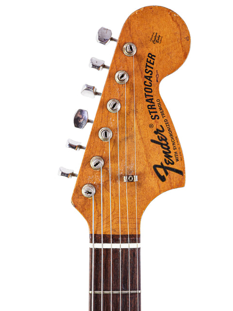 Captivating photo of a 1968 USA Fender Stratocaster, emphasizing its vintage charm and legendary status in music.