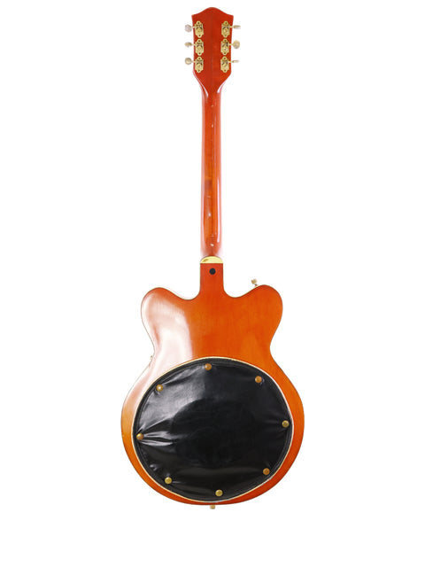 Classic 1964 Gretsch 6120 Chet Atkins guitar featuring a vibrant red body and elegant black headstock, a must-have for players.