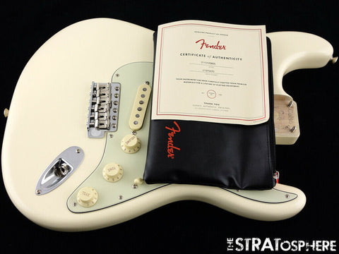 Classic Fender '60s Stratocaster in Olympic White, built with Custom Shop parts, representing timeless electric guitar style.