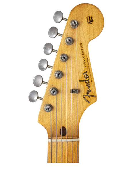 Close-up image of a 1959 USA Fender Stratocaster headstock, highlighting the blond finish and maple neck.