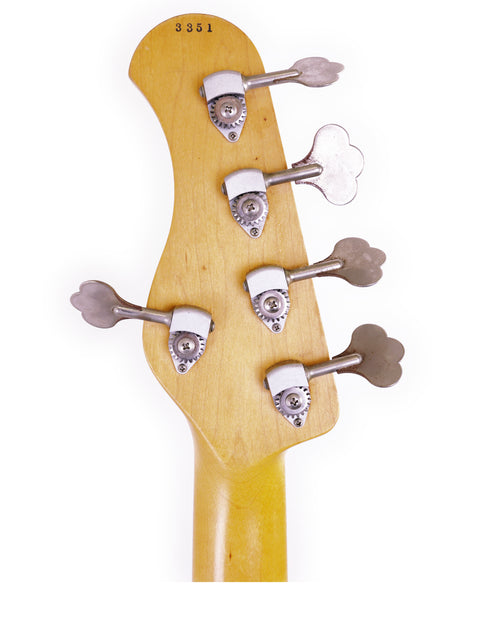 Close-up image of a Sadowsky NYC Jazz Bass 5-string head with four tuning knobs, emphasizing its elegant features.