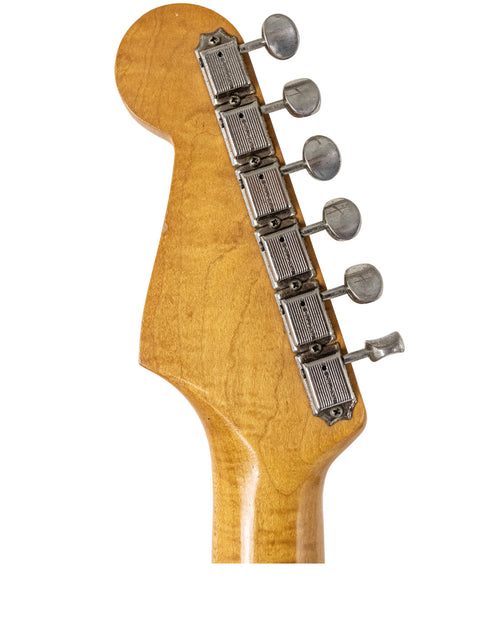Close-up image of the neck of a 1964 USA Fender L Series Stratocaster in Fiesta Red, emphasizing its iconic vintage style.