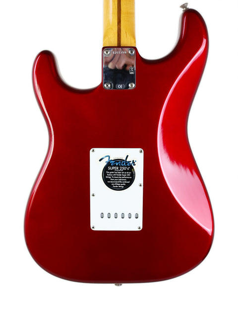 Close-up of a 2007 Fender Vintage Hot Rod '57 Stratocaster, highlighting its iconic shape and rich color.