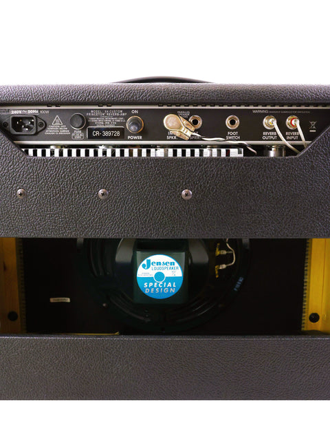Close-up of a Fender '64 Custom Princeton Reverb Combo Amplifier, showcasing a blue sticker that adds character to its vintage look.