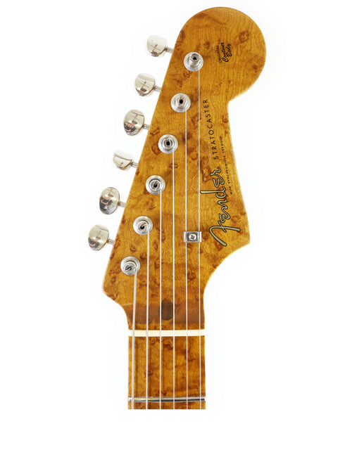 Close-up of a Fender AVRI ‘56 Stratocaster neck, showcasing its smooth finish and detailed fretboard.