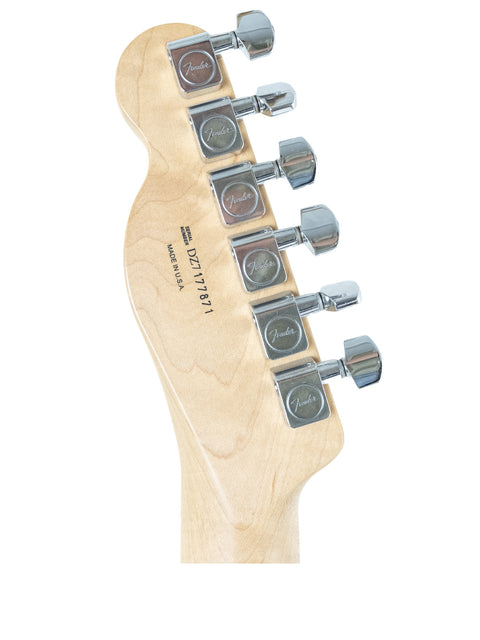 Close-up of a Fender American Deluxe Telecaster neck, showcasing its smooth finish and detailed fretboard.