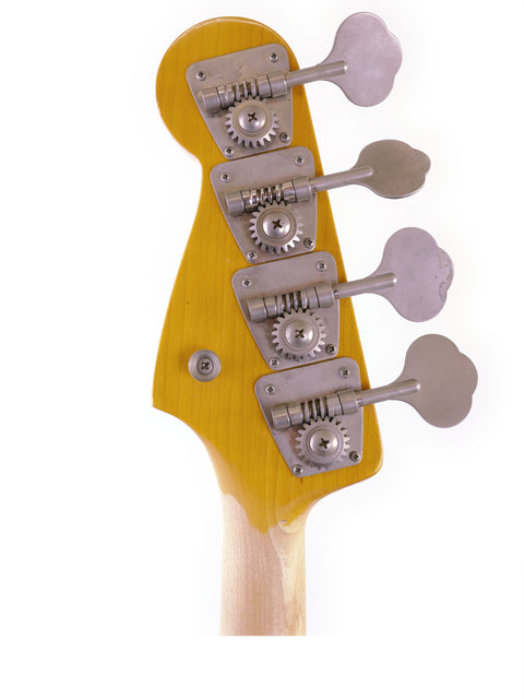 Close-up of a four-string neck from a 1986/87 Fender Jazz Bass, made in Japan, showcasing its elegant design and craftsmanship.