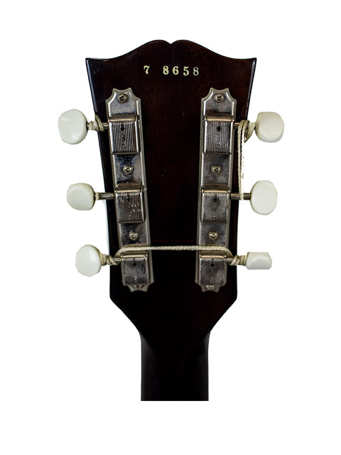 Close-up of the headstock on a Gibson Custom Shop '57 Les Paul Junior Reissue VOS, showcasing a white pickguard.
