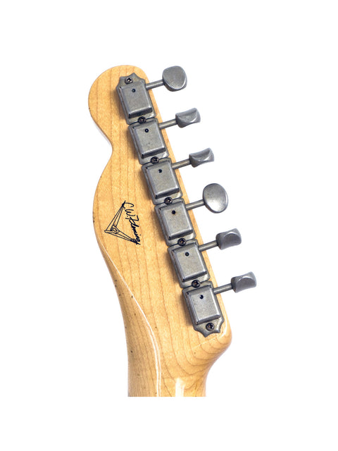 Close-up of the neck of a 2006 Fender Custom Shop electric guitar, emphasizing its quality and unique features.
