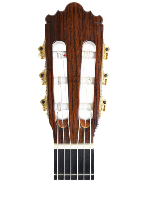 Close-up of the neck of a Ramirez 4NE acoustic guitar, crafted in Spain, 2012, showcasing its elegant design and craftsmanship.