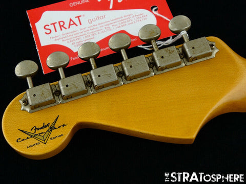 Close-up shot of a Fender '60s Stratocaster, Olympic White, featuring strings and custom shop components from 2020.