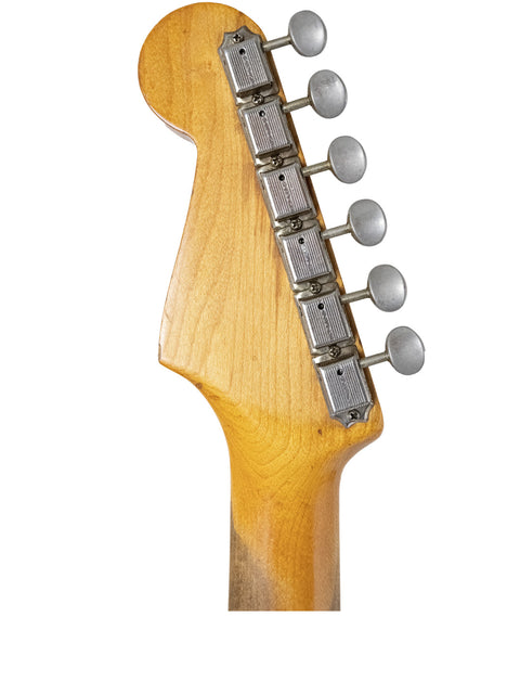 Detailed view of a 1959 Fender Stratocaster's neck, highlighting the blond maple finish and vintage design elements.