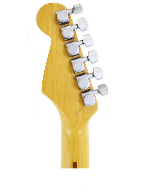 Detailed view of a 1989 Fender Strat Plus Deluxe guitar head, featuring a stark white background.