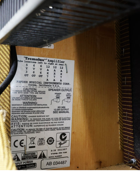 Detailed view of a power supply with a label, specifically for the Fender EC Tremolux Combo Amplifier from 2014.