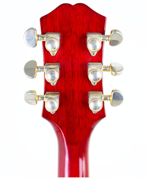 Detailed view of a red guitar headstock with four knobs, representing the Epiphone 50th Anniversary 1962 Sheraton E212T Reissue.