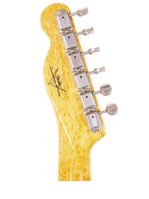 Detailed view of a yellow guitar head, highlighting the craftsmanship of a 1998 Fender Custom Shop 50s Telecaster.