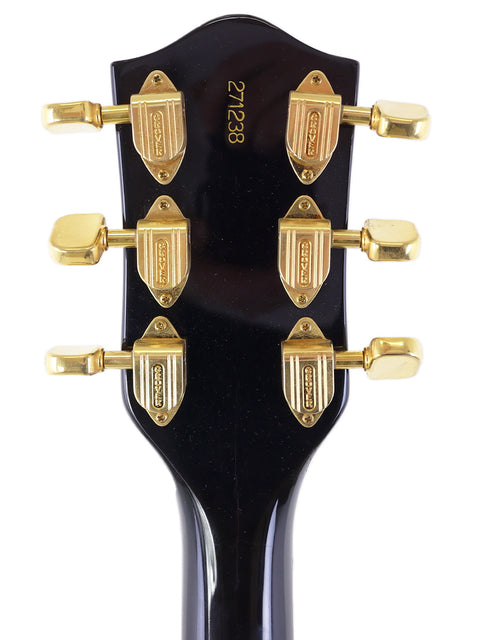 Detailed view of the headstock from a 1967 Gretsch 6122 Chet Atkins Country Gentleman electric guitar, highlighting its craftsmanship.