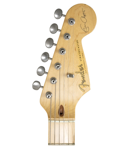 Detailed view of the headstock from a 1988 Fender Eric Clapton Signature Stratocaster, highlighting its iconic features.