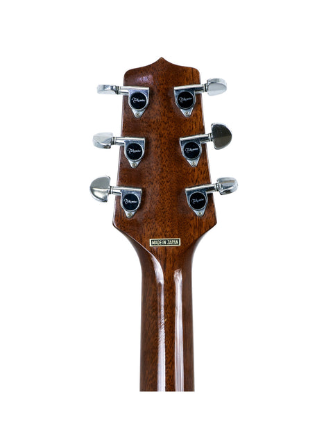Detailed view of the headstock from a 1988 Takamine EF 360SC acoustic guitar, highlighting its elegant features and tuning pegs.