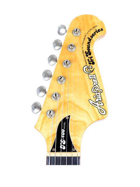 Detailed view of the headstock of an Aria Pro II TS 400 electric guitar, highlighting its classic features from Japan, 1980.