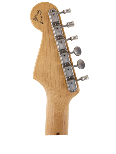 Detailed view of the neck of a 2004 Fender Custom Shop 1954 Strat, highlighting its elegant design and finish.